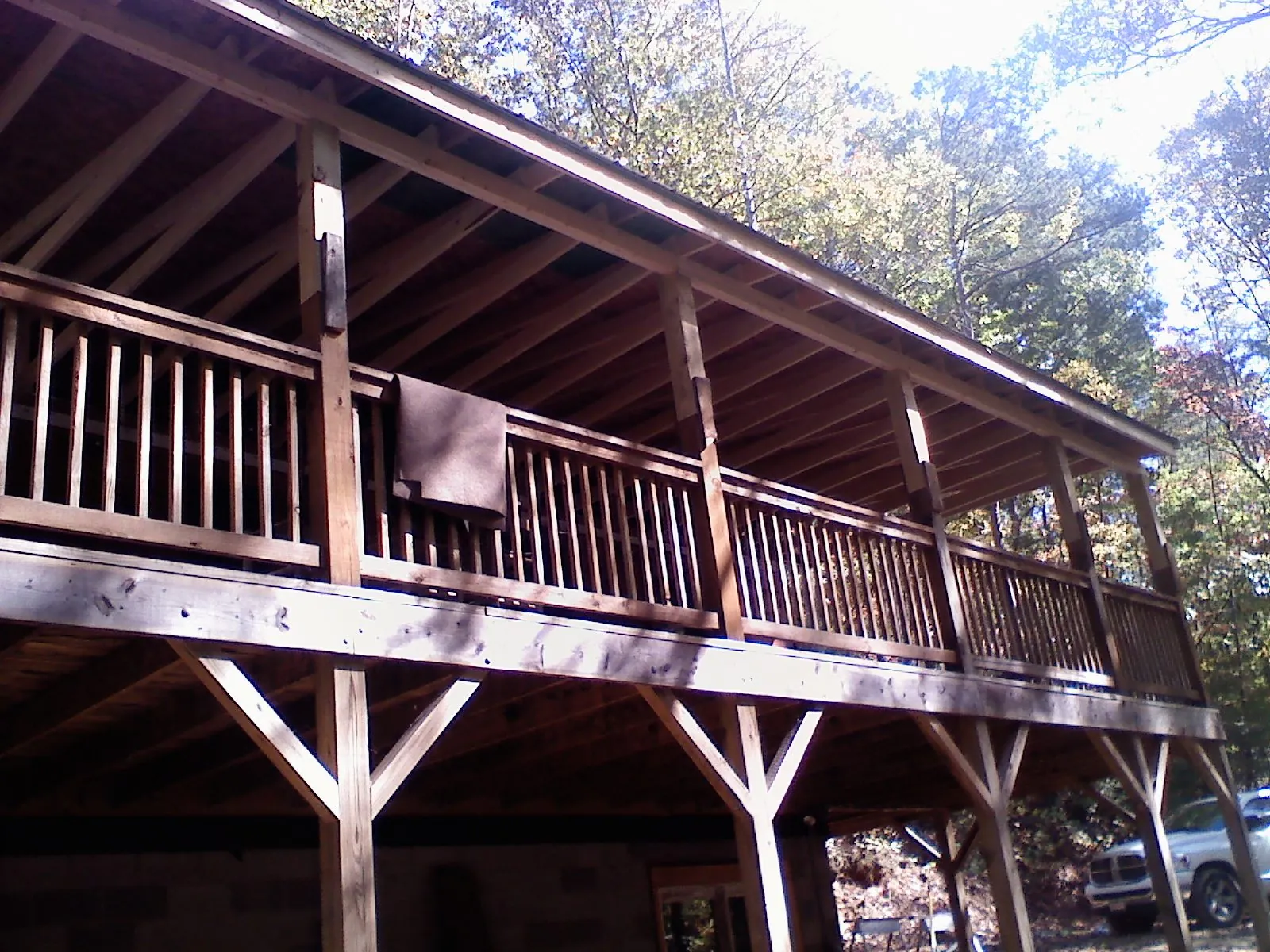 Timber framing under a new elevated porch and deck — Roof Leak Repair in West Alton by Roofing Brothers
